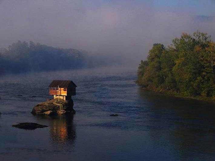 serbian home balances on a rock 5